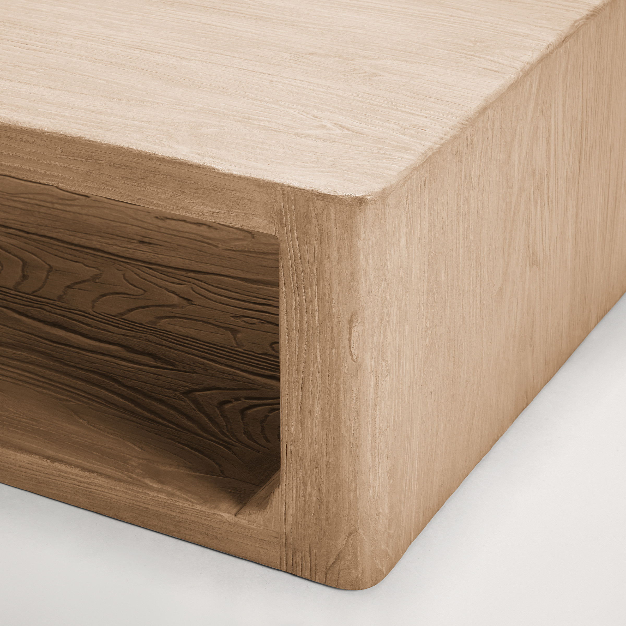 a wooden shelf with a white wall