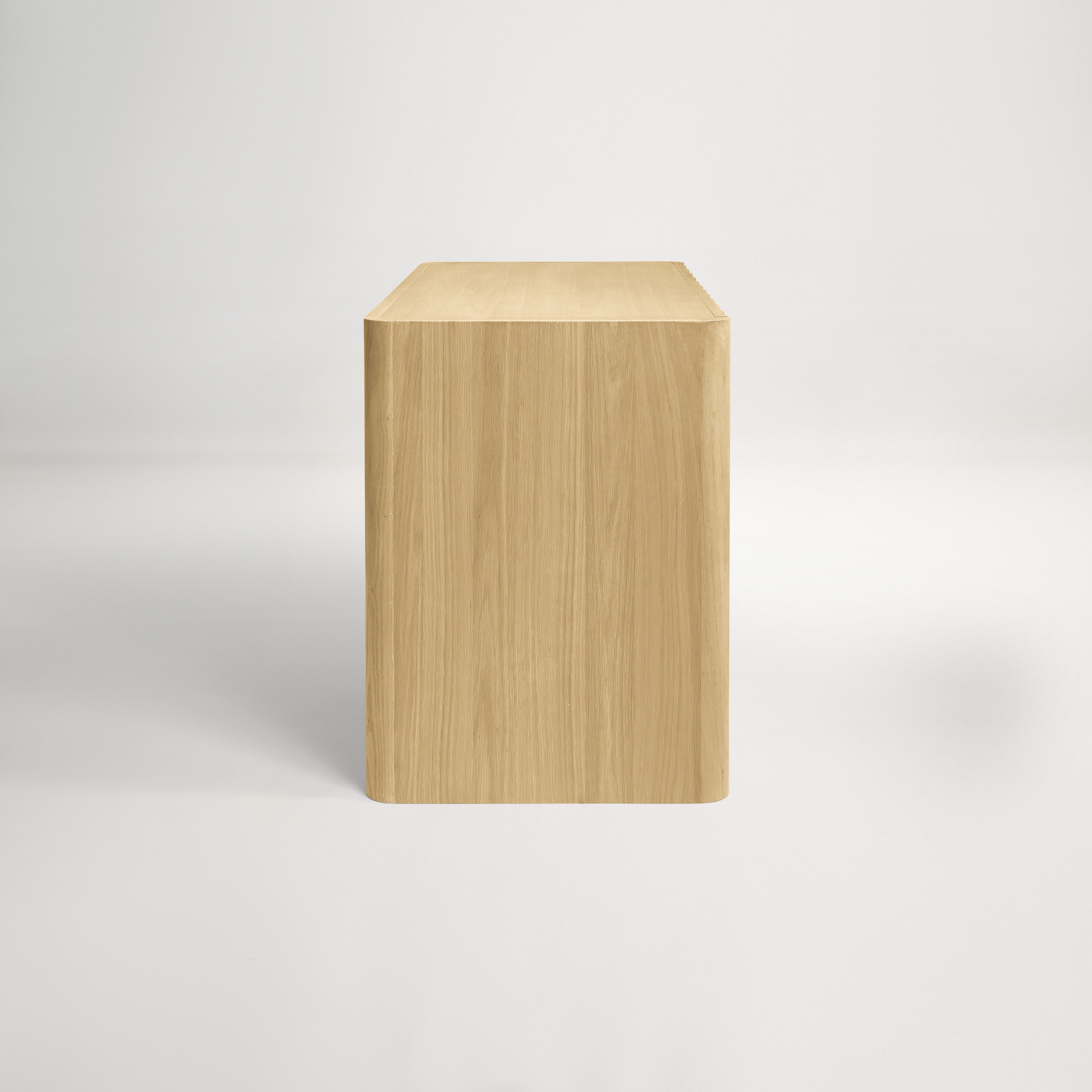 a wooden block on a white background