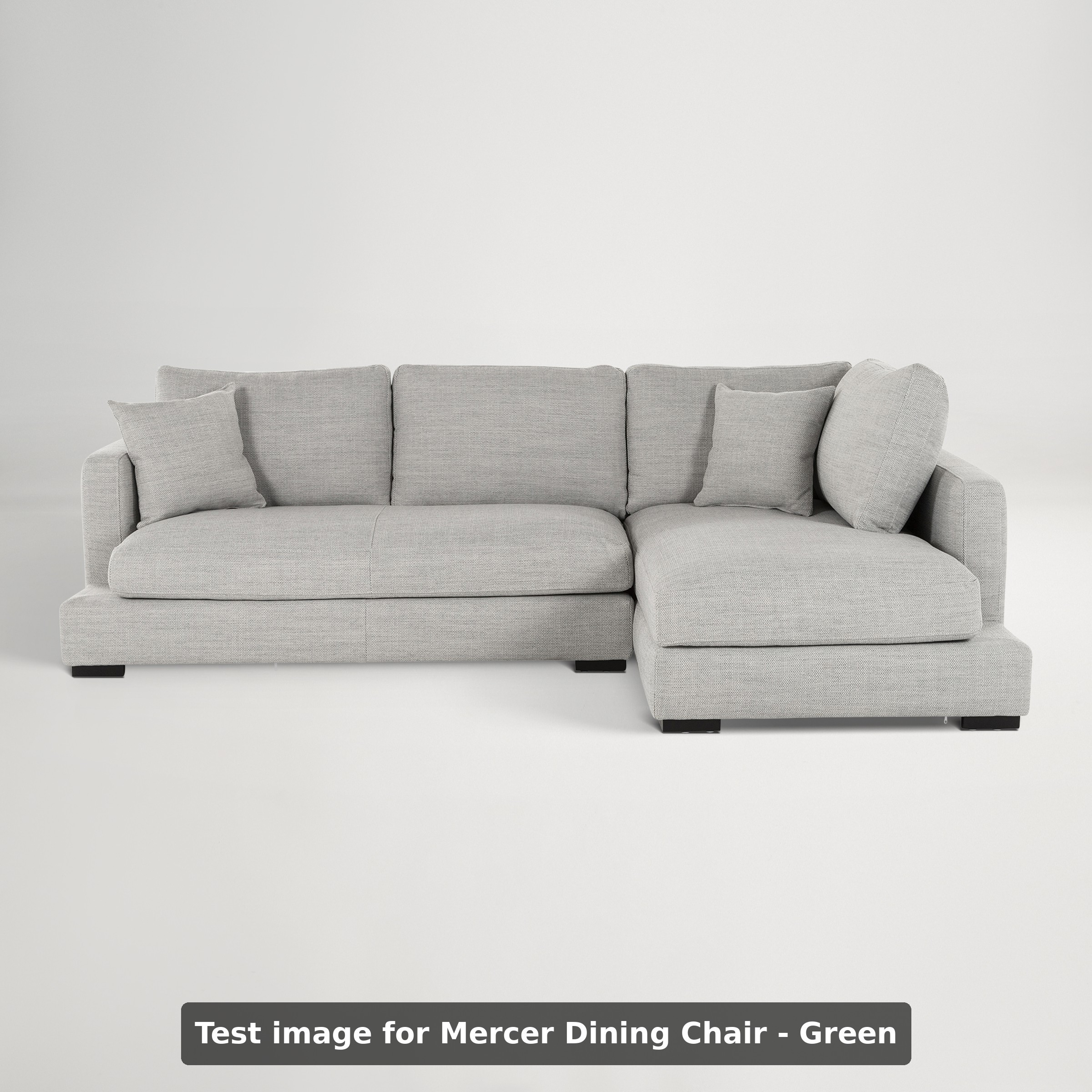 a grey couch with a white background