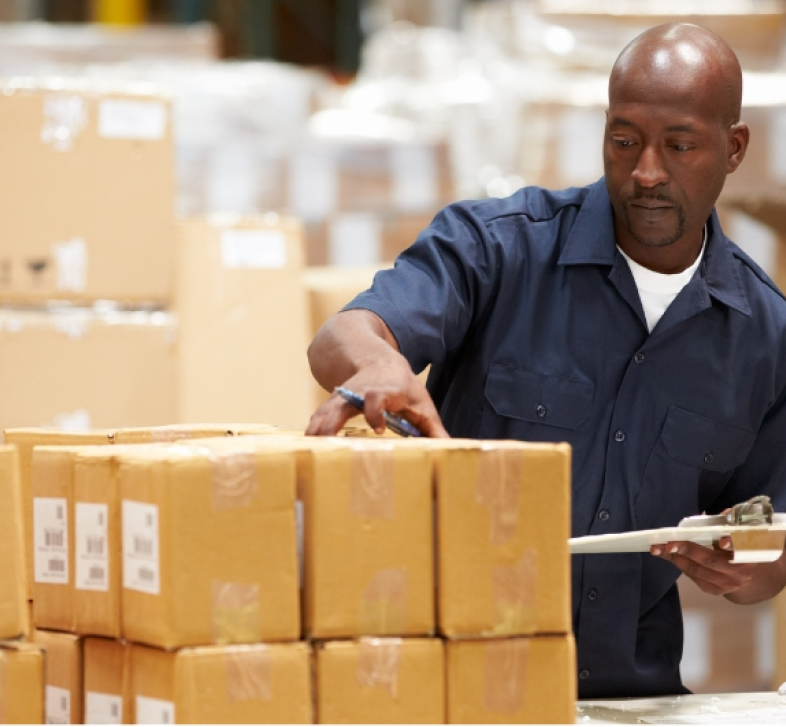 Man inspecting packages