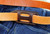 Shield Mini on belt. Horizontal "scout" carry. Back view.