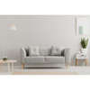 Two-person couch supported by tapered wood legs Two-person couch supported by tapered wood legs