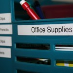 Office Shelf labeled "Office supplies" with label maker