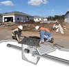 Image and illustration of two workers installing a black drain guard near a residential area for pollution prevention.