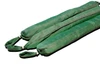 Close-up view of three green, fabric-covered drain protection socks with looped handles on each end, used for sediment and pollutant control.