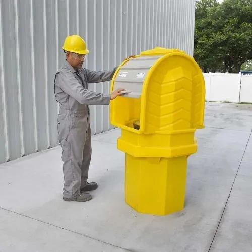Worker inspecting the Hard Top P1 Plus Spill Pallet, showcasing its compact and protective hardtop design.