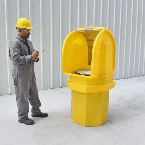 Worker interacting with the Hard Top P1 Plus Spill Pallet, highlighting its space-saving and industrial-grade construction.