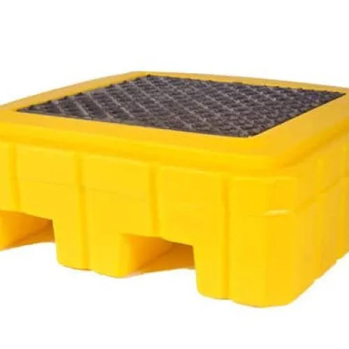 A close-up of a yellow spill pallet with a grated surface, designed for containing spills and safely holding drums.