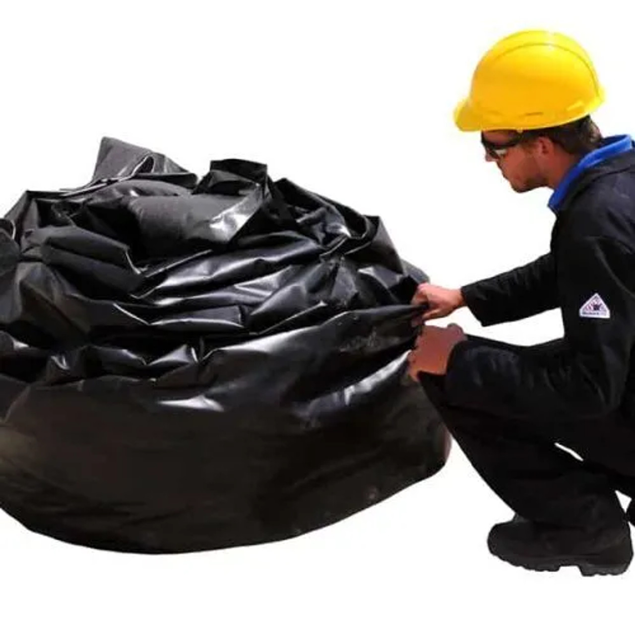 Worker assembling a flexible foam wall containment berm for chemical spill prevention.