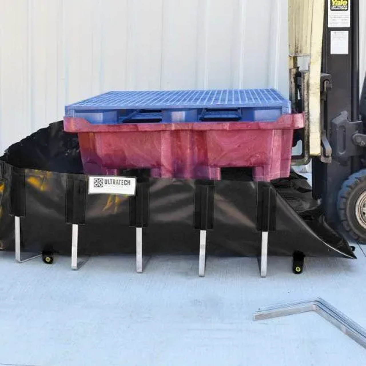 Multiple IBCs placed on an IBC Berm, emphasizing its high-capacity containment and industrial-grade performance.