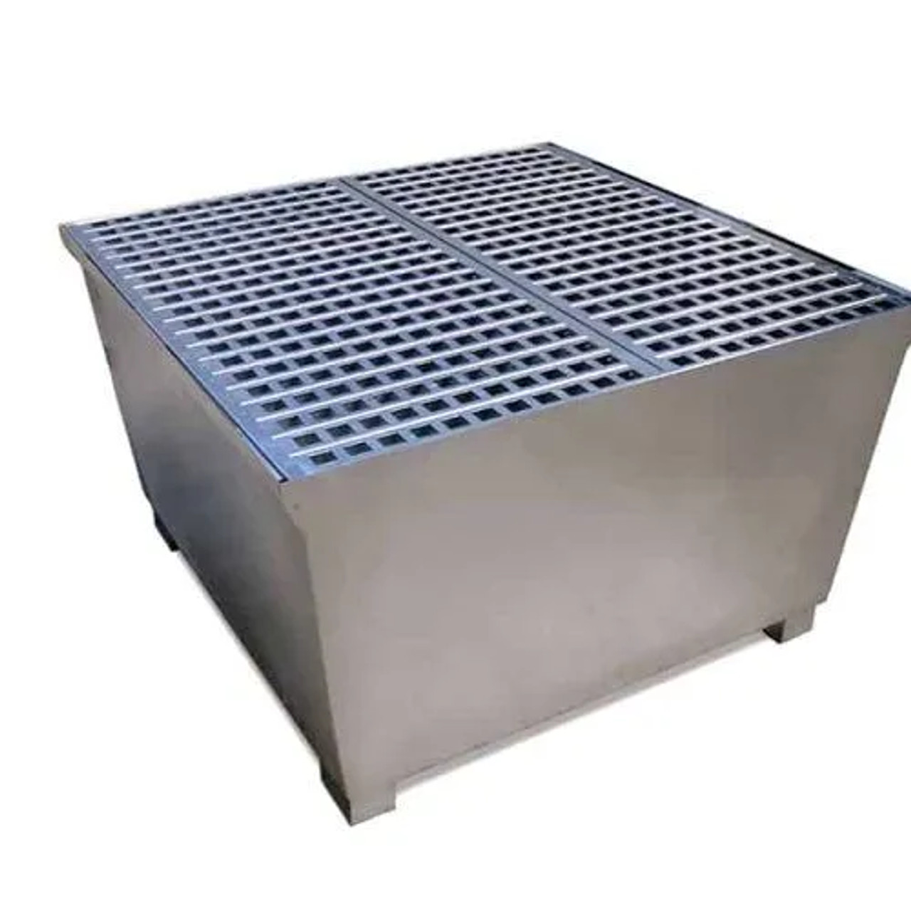 Close-up view of a grated steel IBC spill pallet designed for industrial spill containment and liquid management.