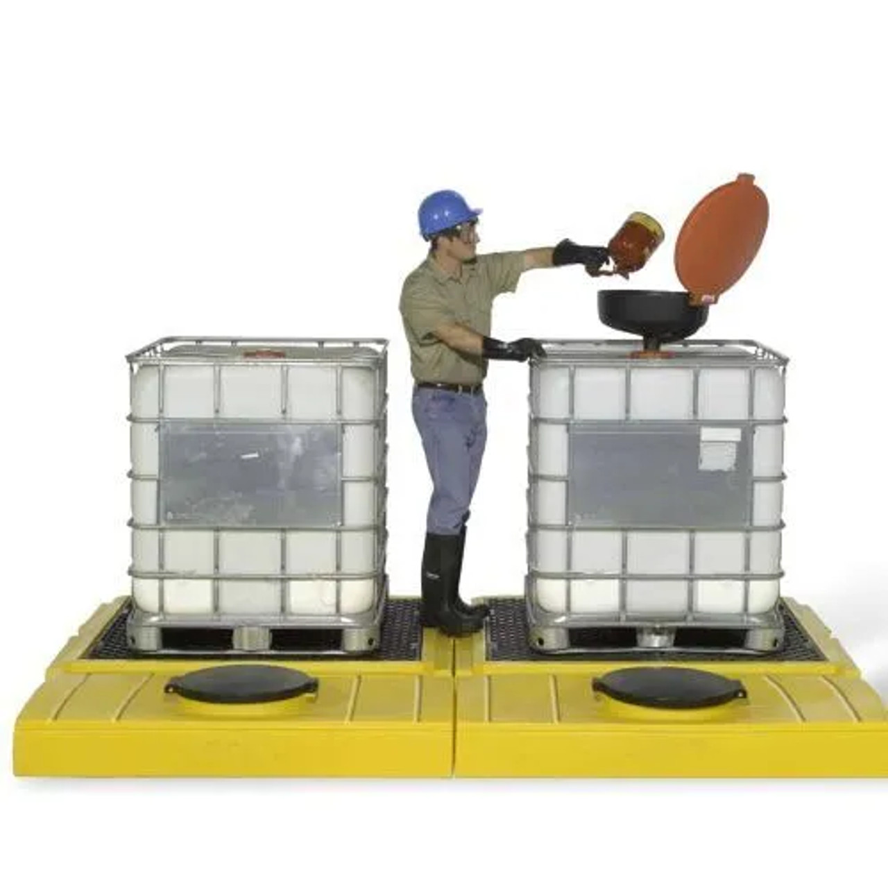 Worker adjusting valves on water storage tank in industrial environment.