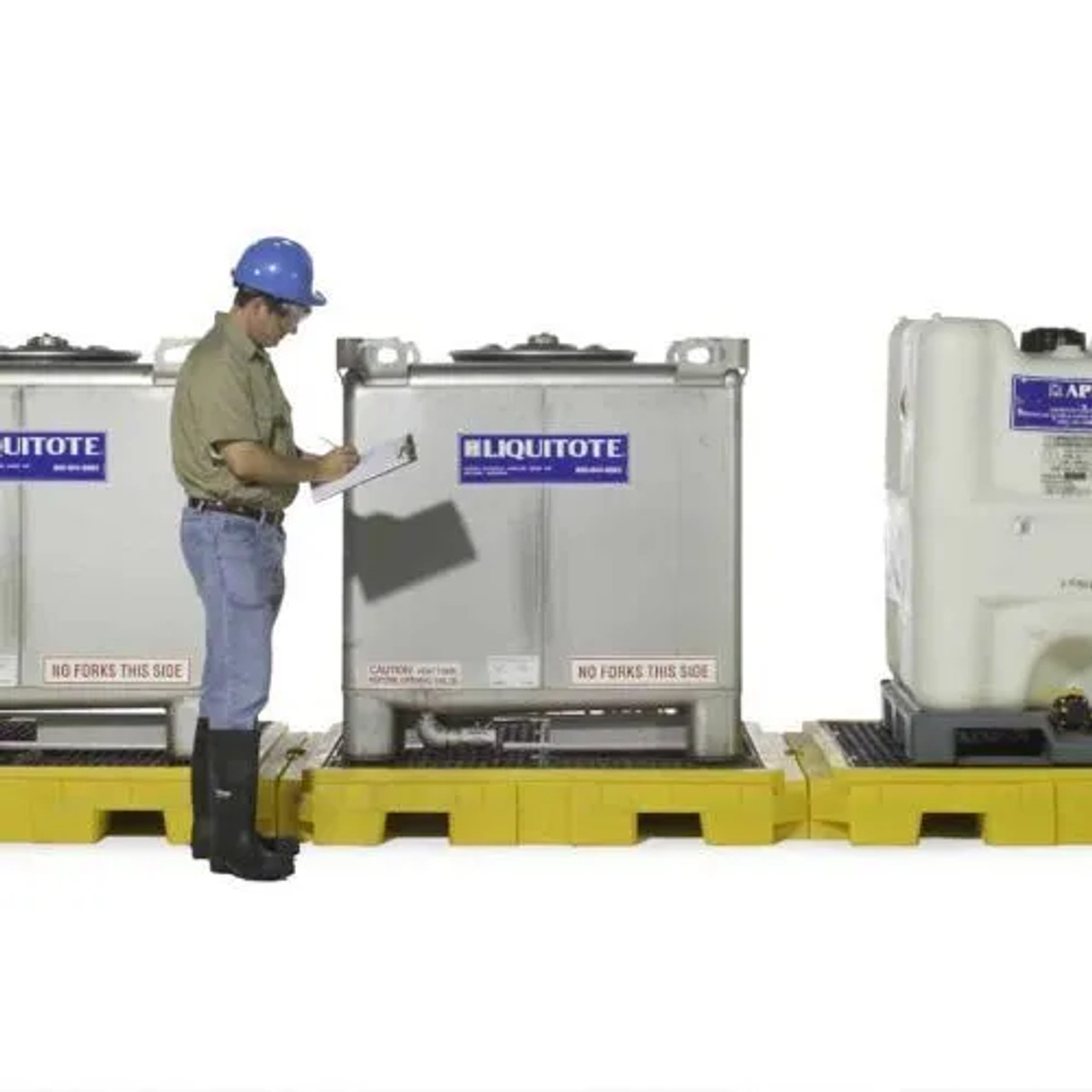 Modular IBC spill pallet system with two tanks, ready for use in an industrial setting for spill protection.