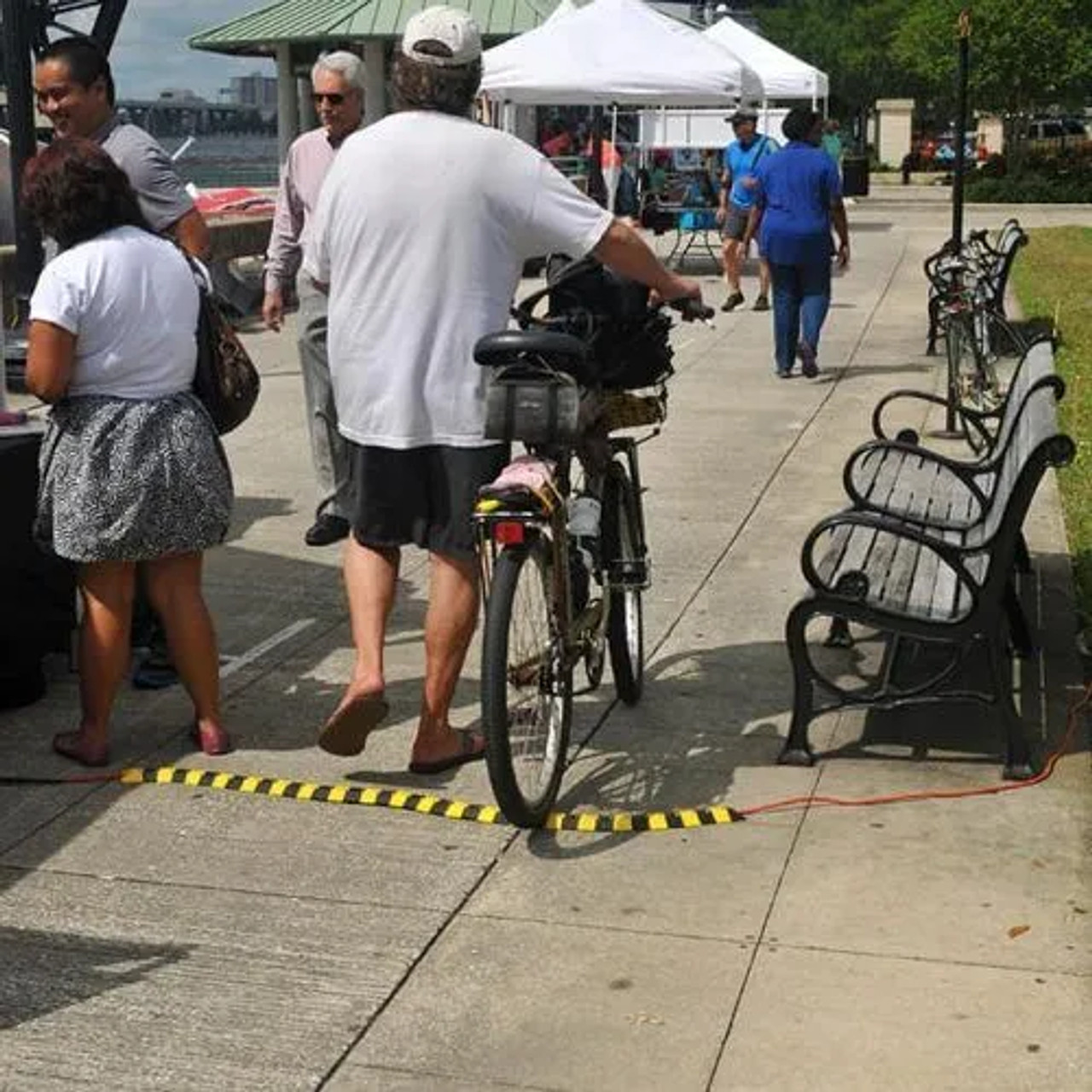 Sidewinder System installed at an outdoor event, providing safe cable coverage and reducing trip hazards.