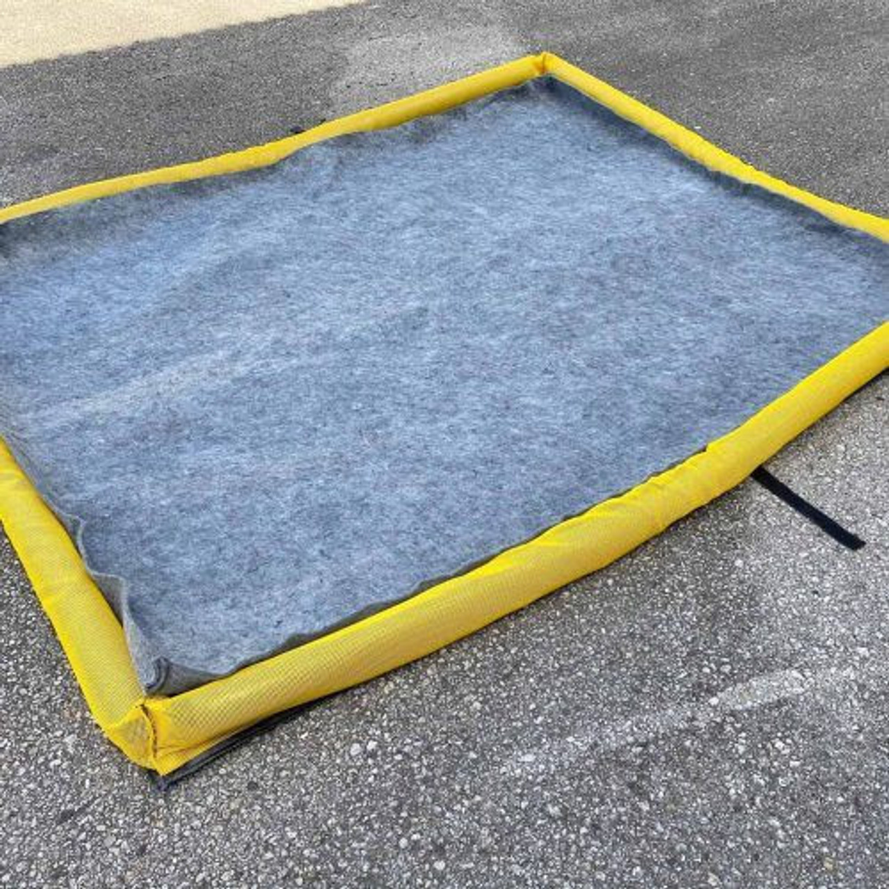 Filter pad with a yellow border, 30 x 24 inches, designed for efficient debris and liquid filtration in industrial and commercial applications.