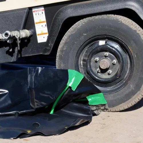 Heavy-duty truck containment berm for spill prevention and environmental compliance.