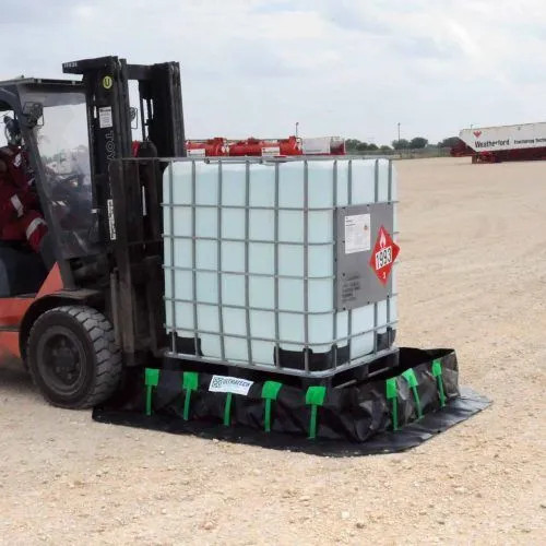 IBC tote containment berm with forklift for spill control and liquid storage safety.