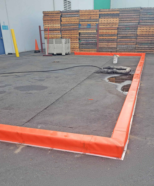 Berm Builder with 6-inch height installed for spill containment.
