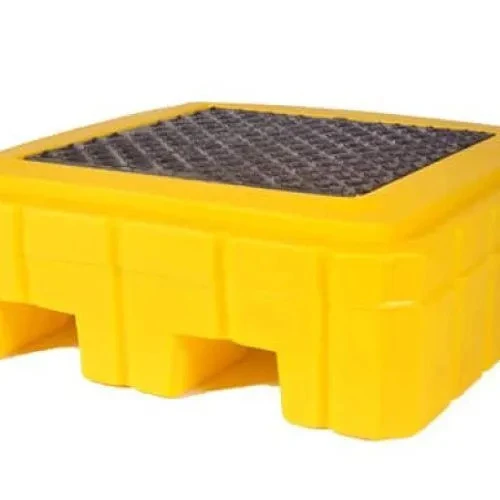 A close-up of a yellow spill pallet with a grated surface, designed for containing spills and safely holding drums.