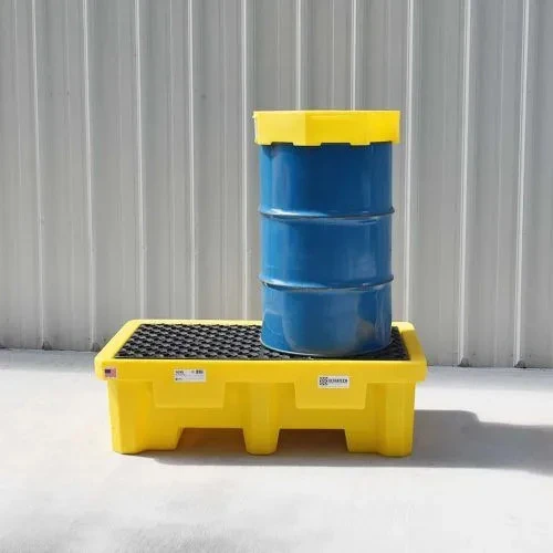 A single blue drum sits securely on a yellow two-drum spill pallet with a grated surface, designed for reliable spill containment.