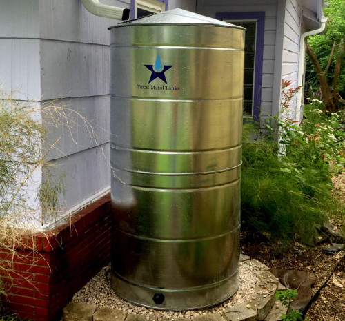 metal tank installed next to a house