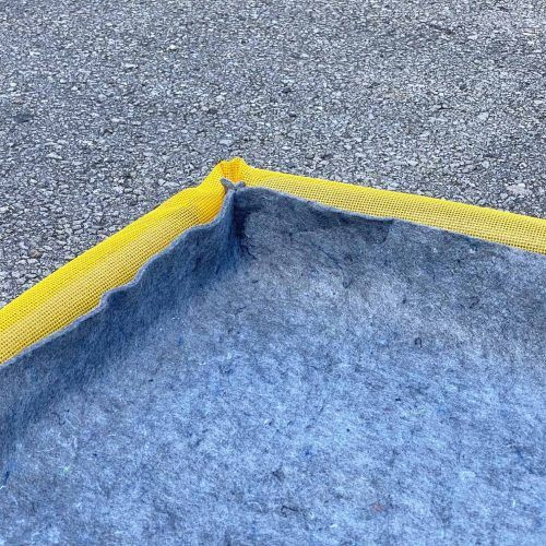 Close-up of a 30 x 24-inch filter pad showcasing its durable and effective material for trapping contaminants and managing spills. Close-up of a 30 x 24-inch filter pad showcasing its durable and effective material for trapping contaminants and managing spills.