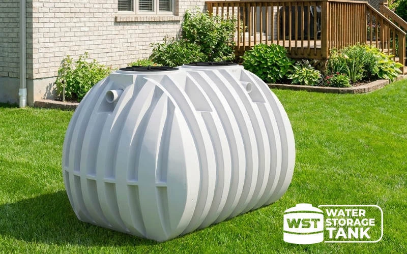 White double chamber septic tank sitting on a yard