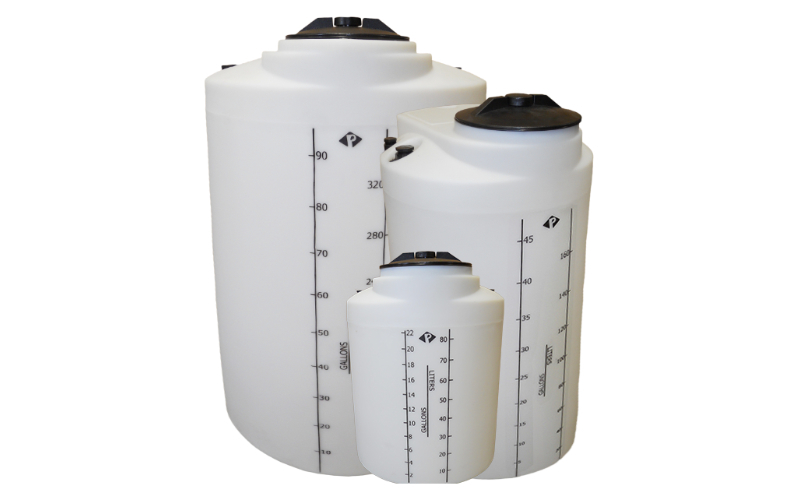 White chemical tanks with black lids