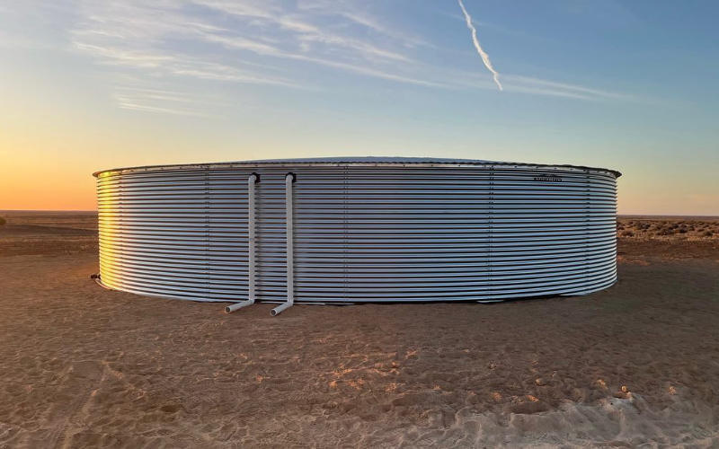 A corrugated water tank installed