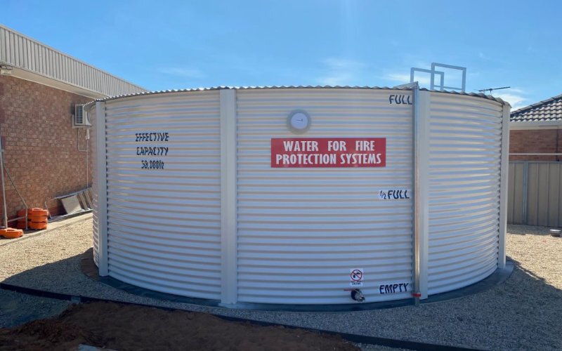 white corrugated steel tank installed for fire protection systems