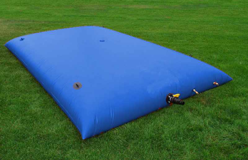Mid-size blue pillow tank for agricultural water storage, dust control, or temporary greywater collection.