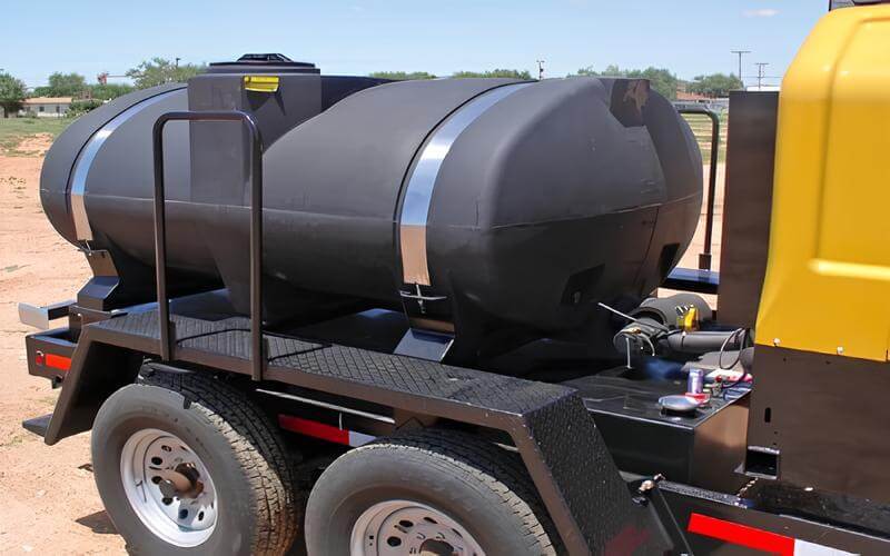 Close-up of the 500-gallon water tank on the combo trailer