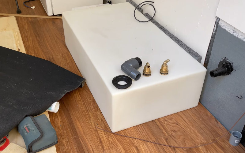 a white rv tank ready to be installed
