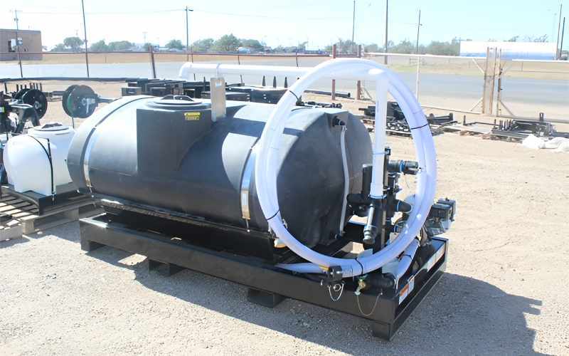 Industrial-grade black water skid unit with high-volume hose reel, built for rugged environments and reliable water delivery in remote field operations.