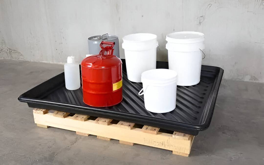 white and red containers on black spill tray