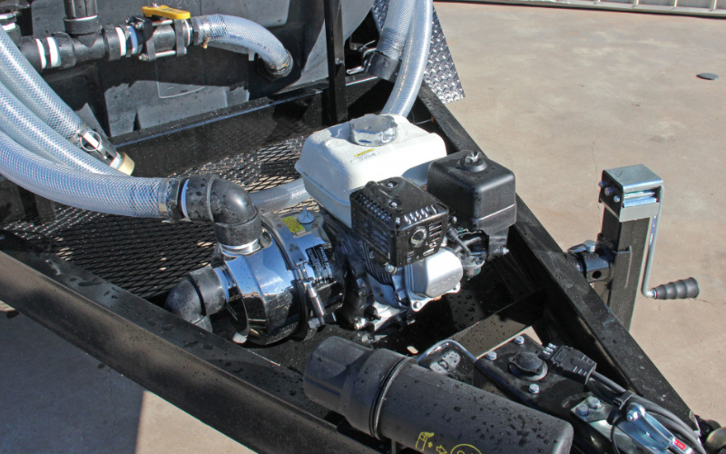 a clos up of the pump system of the 550 gal potable water trailer