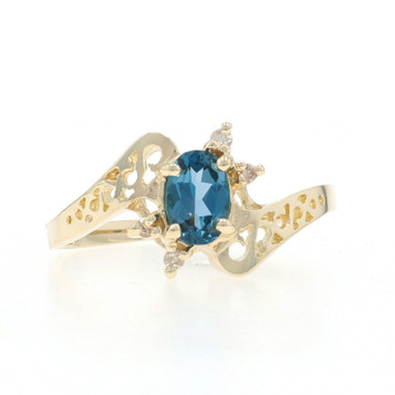Yellow Gold London Blue Topaz Diamond Bypass Ring - 10k Oval .54ctw