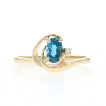 Yellow Gold London Blue Topaz Diamond Wave Ring - 10k Oval .51ctw