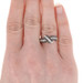 NEW .50ctw Baguette & Single Cut Diamond Ring - Silver Curved Crossover 7 1/4 NEW .50ctw Baguette & Single Cut Diamond Ring - Silver Curved Crossover 7 1/4
