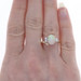 Yellow Gold Opal & Diamond Bypass Ring - 14k Oval Cabochon 1.42ctw Yellow Gold Opal & Diamond Bypass Ring - 14k Oval Cabochon 1.42ctw
