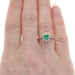 White Gold Emerald & Diamond Halo Ring - 18k Emerald Cut .38ctw White Gold Emerald & Diamond Halo Ring - 18k Emerald Cut .38ctw