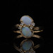 Yellow Gold Opal Diamond Bypass Ring - 14k Oval Cabochon .74ctw Two-Stone Yellow Gold Opal Diamond Bypass Ring - 14k Oval Cabochon .74ctw Two-Stone