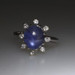 White Gold Star Sapphire Diamond Halo Ring - 14k Oval Cabochon 4.32ctw White Gold Star Sapphire Diamond Halo Ring - 14k Oval Cabochon 4.32ctw