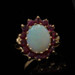 Yellow Gold Opal Ruby Halo Ring - 14k Oval Cabochon 2.28ctw Yellow Gold Opal Ruby Halo Ring - 14k Oval Cabochon 2.28ctw