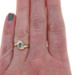 Yellow Gold London Blue Topaz Diamond Bypass Ring - 10k Oval .32ctw