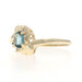 Yellow Gold London Blue Topaz Diamond Bypass Ring - 10k Oval .32ctw