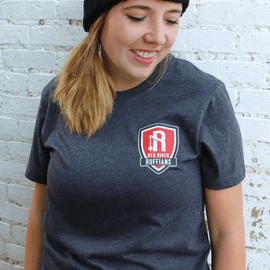 Red River Ruffians Fanwear Tee in dark grey heather with a 52/48 Airlume combed and ring spun cotton/poly blend for a soft feel.