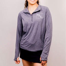 Custom 1/2 zip pullover with embroidered design on left chest.