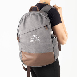Custom embroidered backpack made from 100% cotton canvas with padded laptop sleeve