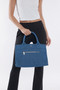 ClaraNY Denim book tote indigo denim spacious and charming  with "The Tote Bag"  letteringlder strap